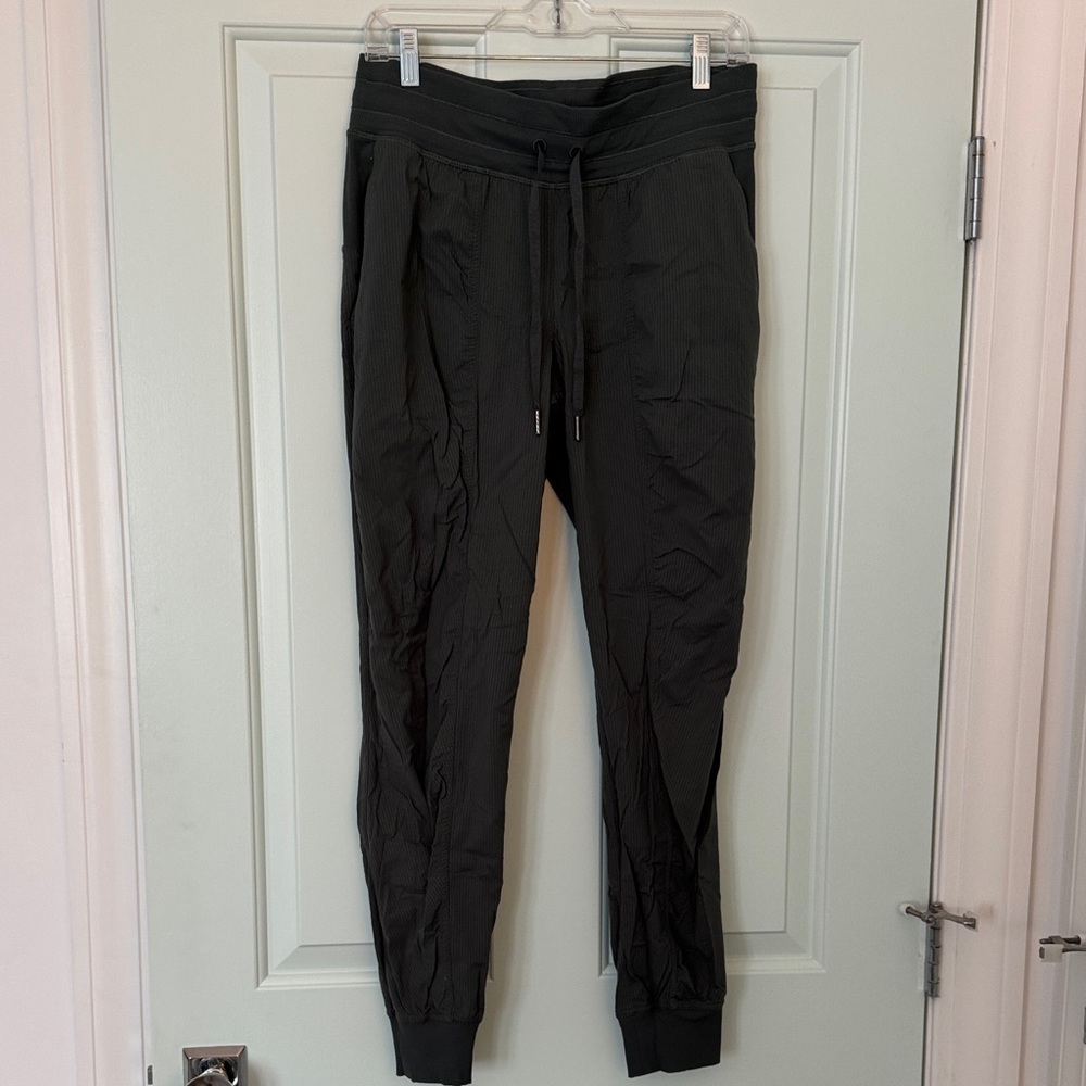 Woman’s green Lululemon studio pant
